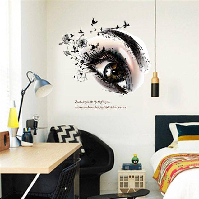Barevná samolepka na stěnu | nálepka na zeď - Oko s motýli a kytkami