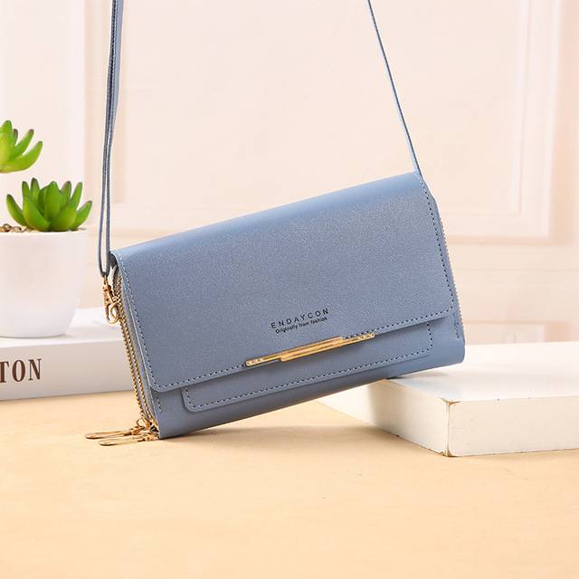 Módní dámská kabelka s peněženkou - modrý