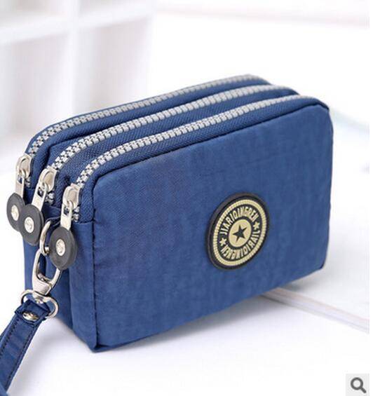 Prostorná dámská peněženka na zip - modrý